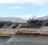 Port Bouvard Retreat - Large Family Friendly Canal Home with Private Jetty - Accommodation Noosa