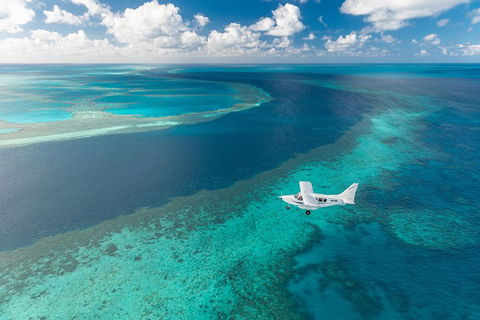 Great Barrier Reef Scenic Flight And Ocean Rafting Whitehaven Beach Day Trip - Accommodation Noosa 3